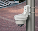 security camera overlooking a brick walkway