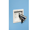 combination power low voltage electrical box installed on wall with cables visible
