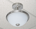 ceiling fixture mounted to ceiling grid