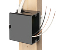 adjustable outlet box mounted to wooden stud