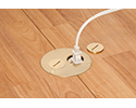 floor box in wooden floor with device plugged into receptacle