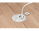 floor box in wooden floor with device plugged into receptacle