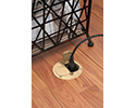 floor box in wooden floor with device plugged into receptacle