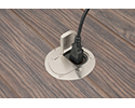 floor box in wooden floor with device plugged into receptacle