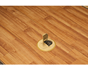 floor box in wooden floor with flip lid open