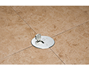 floor box in stone tiled floor with flip lid open