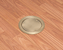 floor box with blank cover in wooden floor