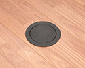 floor box with blank cover in wooden floor