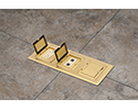 three gang floor box in tiled floor with flip lids open