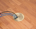 in-box recessed floor box with in use cover and wires exiting box