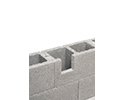 concrete block wall with hole cut for box