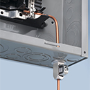 grounding connector installed on outside of enclosure