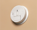 smoke detector mounted on low voltage mounting bracket