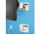 bridge kit in wall, upper box hidden by TV, lower box plugged in to outlet