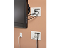 bridge kit in wall, upper box hidden by TV, lower box plugged in to outlet