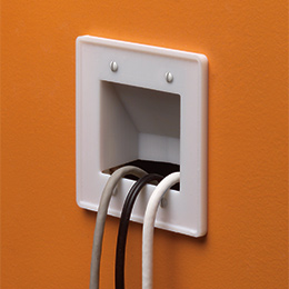 SCOOP entrance plate mounted on a wall with wires coming out